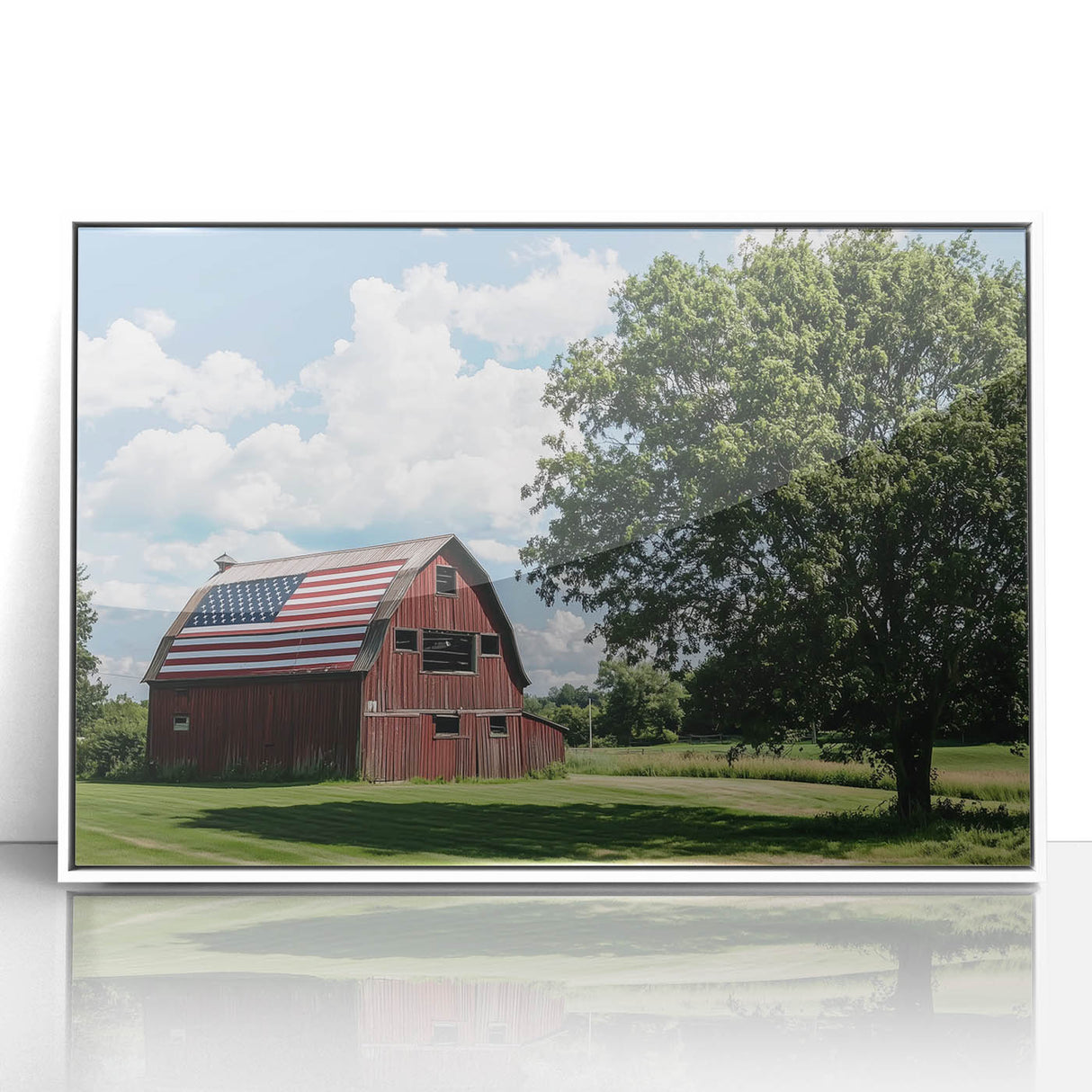 Framed acrylic wall art featuring a vibrant landscape design with a rustic barn, presented in a sleek white frame, ideal for home decor enhancement.