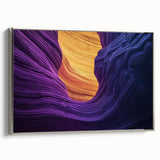 Framed canvas art depicting a serene landscape of canyons, featuring rich earth tones and a silver frame, ideal for enhancing modern home decor. The artwork captures the beauty of nature, making it a perfect focal point for living spaces or offices.