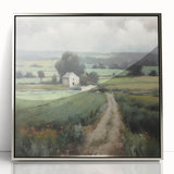 Framed acrylic wall art depicting a serene countryside landscape with vibrant green fields and a clear blue sky, elegantly designed in a silver frame. Ideal for home decor.