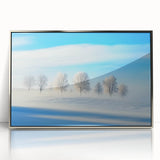 Framed acrylic artwork showcasing a serene countryside landscape with lush green fields and a clear blue sky, elegantly mounted in a silver frame for a modern aesthetic.