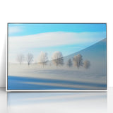 Framed acrylic artwork depicting a serene countryside landscape featuring rolling hills and vibrant greenery, mounted in a sleek white frame for modern decor.