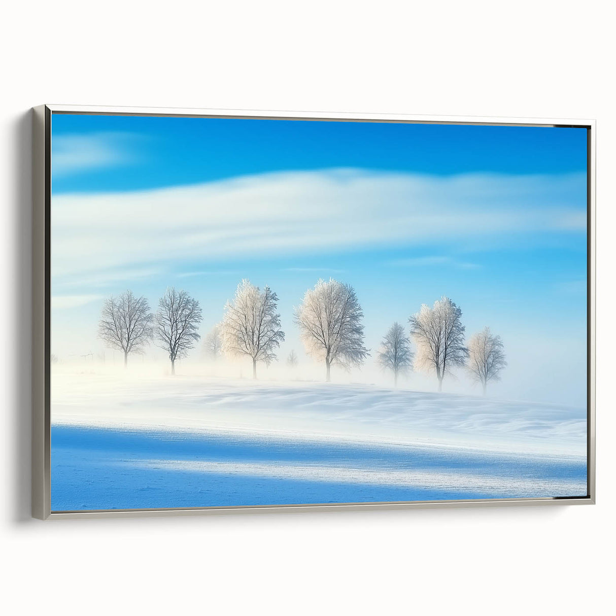 Framed canvas artwork showcasing a serene countryside landscape with vibrant green fields and a tranquil sky, elegantly bordered in silver, ideal for home decor.