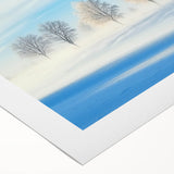 Rolled canvas showcasing a serene countryside landscape with vibrant green fields and a clear blue sky, elegantly packaged in a protective cardboard tube for safe shipping.