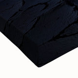 Close-up of a vibrant desert landscape stretched canvas, showcasing warm tones of orange and yellow with intricate details of sand dunes and blue skies, perfect for home decor.