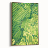 Framed canvas featuring a vintage-style landscape painting with muted green and brown tones, ideal for bedroom wall art.