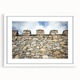 Elegant landscape artwork featuring a majestic castle framed in white with a mat, ideal for home decor and interior design. The piece captures a serene view, enhancing the ambiance of any room.
