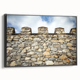 Framed canvas artwork depicting a picturesque landscape with a castle, featuring a black frame. The side view highlights its elegant design, perfect for home decor.