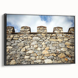 Framed canvas artwork depicting a picturesque landscape with a castle, featuring a black frame. The side view highlights its elegant design, perfect for home decor.