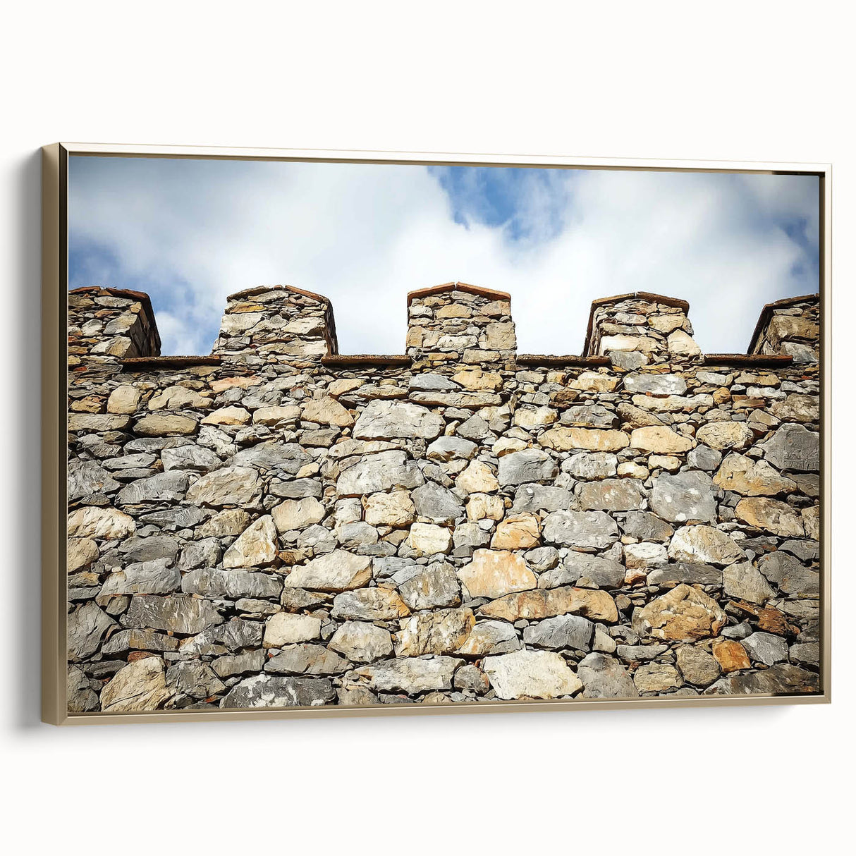 Framed canvas artwork showcasing a stunning landscape with castles, presented in an elegant gold frame, perfect for adding a touch of sophistication to home decor.
