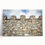 Stretched canvas art depicting a serene landscape with a majestic castle amidst lush greenery and a vibrant sky, perfect for enhancing home decor.