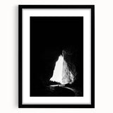 Framed landscape artwork featuring a serene cave scene with a black mat, designed to enhance home decor with its natural beauty and calming colors.