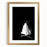 Framed landscape artwork depicting a serene cave scene, highlighted by a gold matting and elegant frame, perfect for home decor and art enthusiasts.