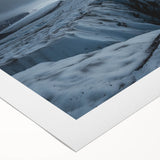 Serene rolled canvas artwork depicting vibrant landscapes with cliffs, showcasing rich colors and textures, elegantly packaged in a protective cardboard tube.