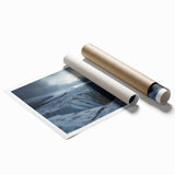 Stunning landscape canvas print showcasing dramatic cliffs and serene ocean waves, rolled and packaged in a protective tube for easy transport and display.