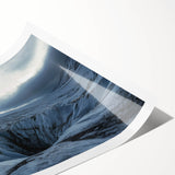 A stunning rolled print showcasing a dramatic cliff landscape, featuring vibrant colors and intricate details, packed securely in a durable cardboard tube for safe shipping. Captures the essence of nature's beauty, perfect for home decor enthusiasts.