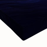 Close-up of a vibrant landscape canvas print depicting colorful canyons, showcasing rich textures and earthy tones, perfect for home decor enhancement.