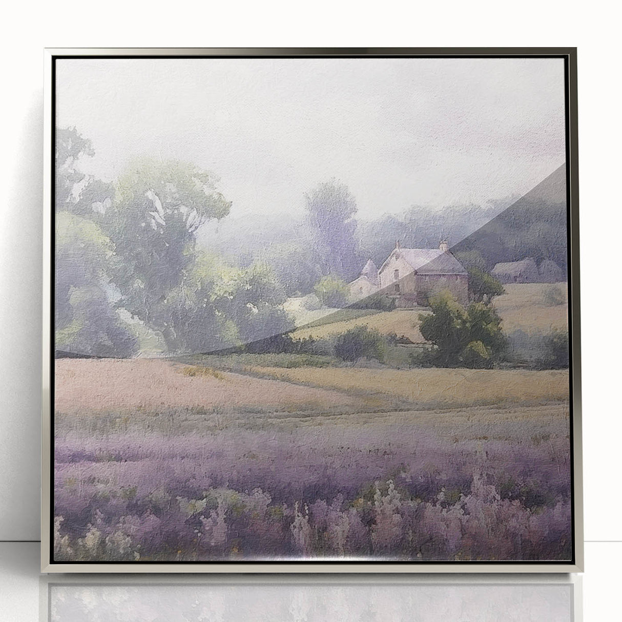 Framed acrylic wall art showcasing a serene countryside landscape, featuring lush green fields and a vibrant blue sky, elegantly displayed in a silver frame.