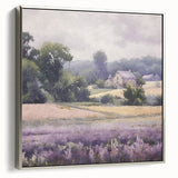 Framed landscape wall art depicting a serene countryside scene with lush green fields and a blue sky, featuring a sleek silver frame that enhances its elegance. Ideal for home decor and art enthusiasts.