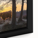 Close-up of a framed canvas depicting a serene countryside landscape with lush greenery, rolling hills, and a bright blue sky, perfect for home decor.