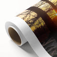 Vibrant rolled canvas showcasing a serene countryside landscape with lush green fields and a clear blue sky, elegantly packaged in a protective cardboard tube.