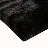 Close-up of a stretched canvas showcasing a vibrant countryside landscape with rolling hills and a clear blue sky, ideal for home decor and art enthusiasts.