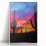 Framed acrylic artwork depicting a vibrant desert landscape with warm tones of orange and yellow, set against a sleek white frame, ideal for modern decor.