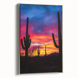 Framed canvas artwork depicting a serene desert landscape with soft colors and intricate details, presented in a sleek silver frame, enhancing any modern decor.