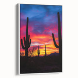 Framed canvas artwork depicting a stunning desert landscape, showcasing warm earth tones and intricate details, elegantly displayed against a white background.