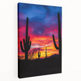 Stretched canvas artwork depicting a serene desert landscape with vibrant hues of orange, yellow, and blue, highlighting a tranquil sunset over sand dunes.