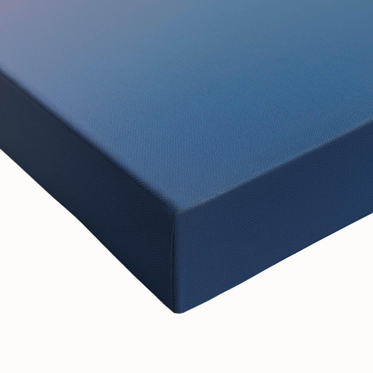 Vibrant close-up of stretched canvas artwork showcasing a serene landscape with lush green fields under a clear blue sky, perfect for home decor.