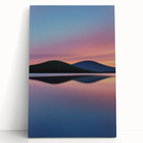 Stretched canvas art depicting vibrant green landscapes and golden fields, leaning against a neutral wall, ideal for home decor and nature-inspired themes.