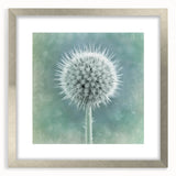 Textured art print of abstract florals in muted green and silver, framed in silver, suitable for bedroom decor.
