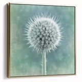 Framed canvas featuring a black and white vintage landscape with silver and gold floral accents.