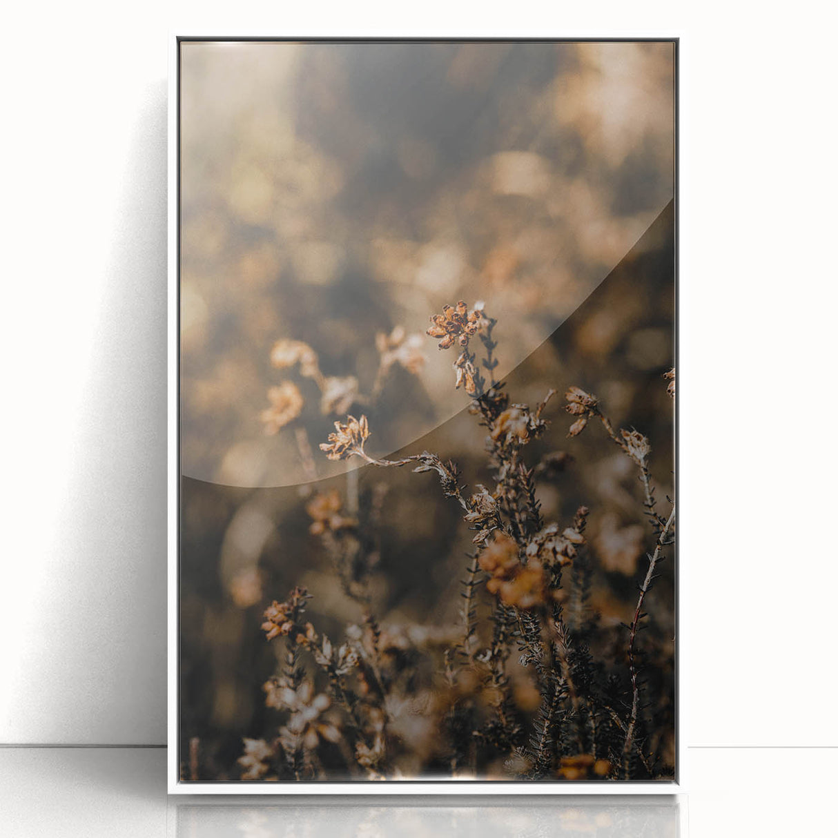 Art deco poster featuring autumnal trees in orange and brown tones on a white acrylic framed print.