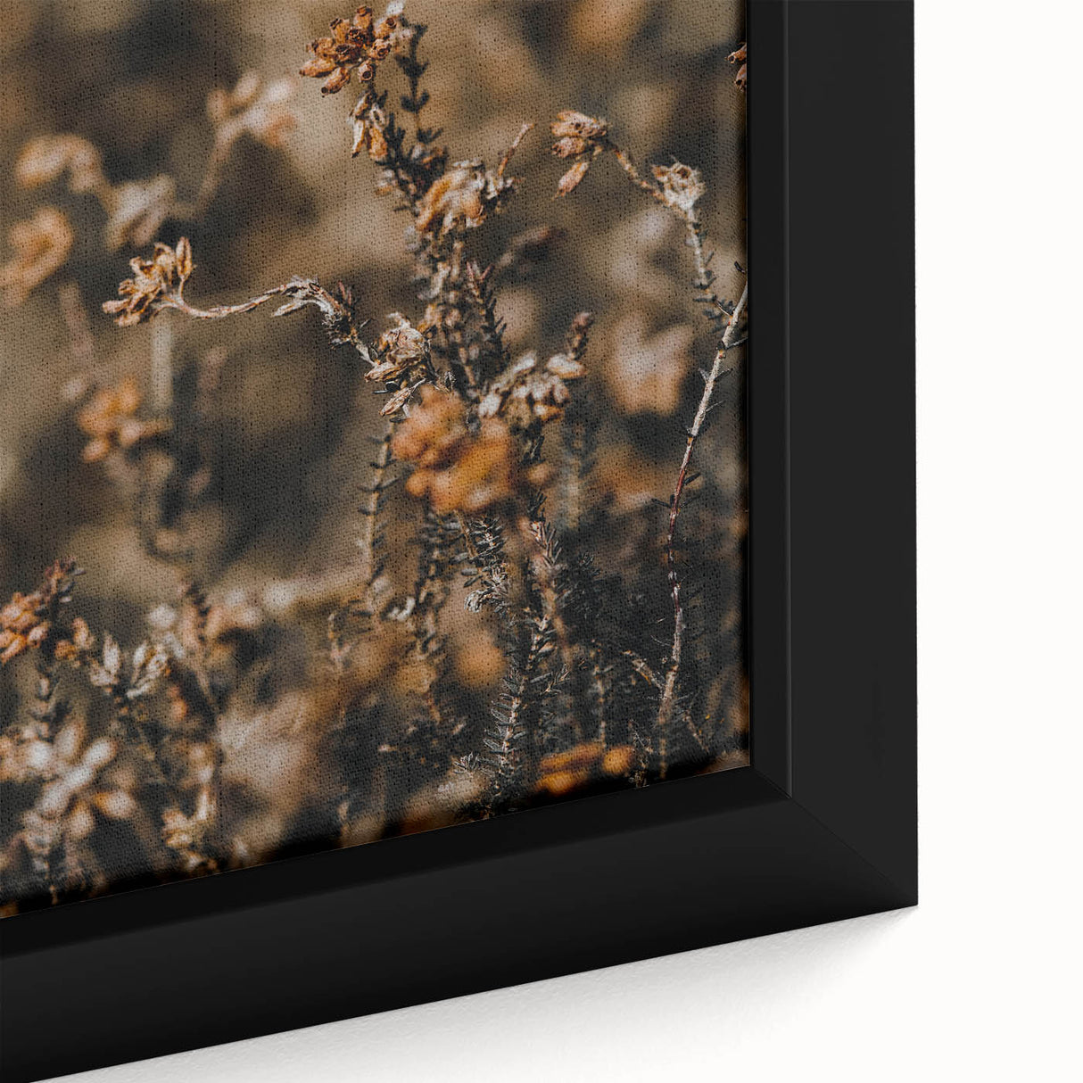Close-up of extra large black wall art featuring a textured, colorful abstract design on framed canvas.