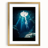 Framed landscape artwork showcasing intricate cave designs in a gold mat. The piece features rich colors and textures, perfect for enhancing modern decor.