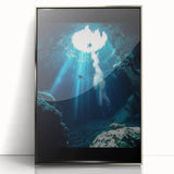 Framed acrylic artwork showcasing a stunning landscape with intricate cave designs, featuring a sleek silver frame that enhances its visual appeal and modern aesthetic.