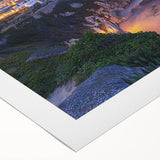 Vibrant rolled canvas artwork showcasing a stunning landscape of cliffs against a bright sky, perfect for enhancing home decor with natural beauty.