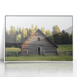 Framed acrylic wall art depicting a serene landscape with a rustic barn, featuring vibrant colors and intricate details, perfect for home décor.