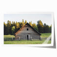 Landscape barn scene rolled print showcasing a rustic red barn amidst green fields and a vibrant blue sky, elegantly packaged in a protective cardboard tube. Perfect for country-themed decor.