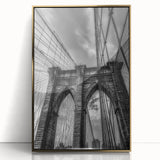 Framed acrylic artwork of a landscape bridge in gold tones, showcasing intricate details and reflections, perfect for modern decor and art enthusiasts.