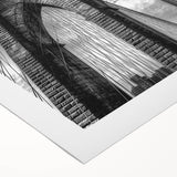 Rolled canvas showcasing a vibrant African tribal wall art design, featuring intricate patterns and rich colors, neatly packaged in a durable cardboard tube for safe storage.