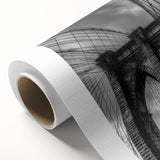 Rolled canvas print showcasing a vibrant landscape bridge design with rich colors, carefully packaged in a protective cardboard tube for safe shipping.