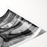 Landscape bridge rolled print showcasing a serene river scene with a vibrant sunset, rolled neatly in a protective cardboard tube for safe shipping and easy display. Ideal for home decor enthusiasts looking for unique wall art.