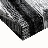 Close-up of a stretched canvas featuring a vibrant landscape bridge design, showcasing rich colors and intricate details, perfect for home decor.