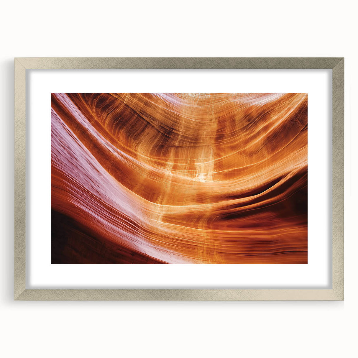 Landscape art print featuring a silver-framed canyon scene with a mat, showcasing rich colors and intricate details, perfect for enhancing home decor.