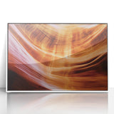 Framed acrylic artwork showcasing a stunning landscape of colorful canyons, featuring vibrant hues of orange, red, and blue. Ideal for home décor and art enthusiasts.