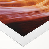 Vibrant rolled canvas depicting stunning desert canyons at sunset, showcasing rich orange and purple hues, perfect for home decor or landscape art enthusiasts.