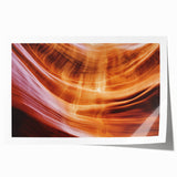 Vibrant landscape print showcasing dramatic canyons under a blue sky, rolled for easy display, ideal for home decor or art enthusiasts seeking natural beauty.