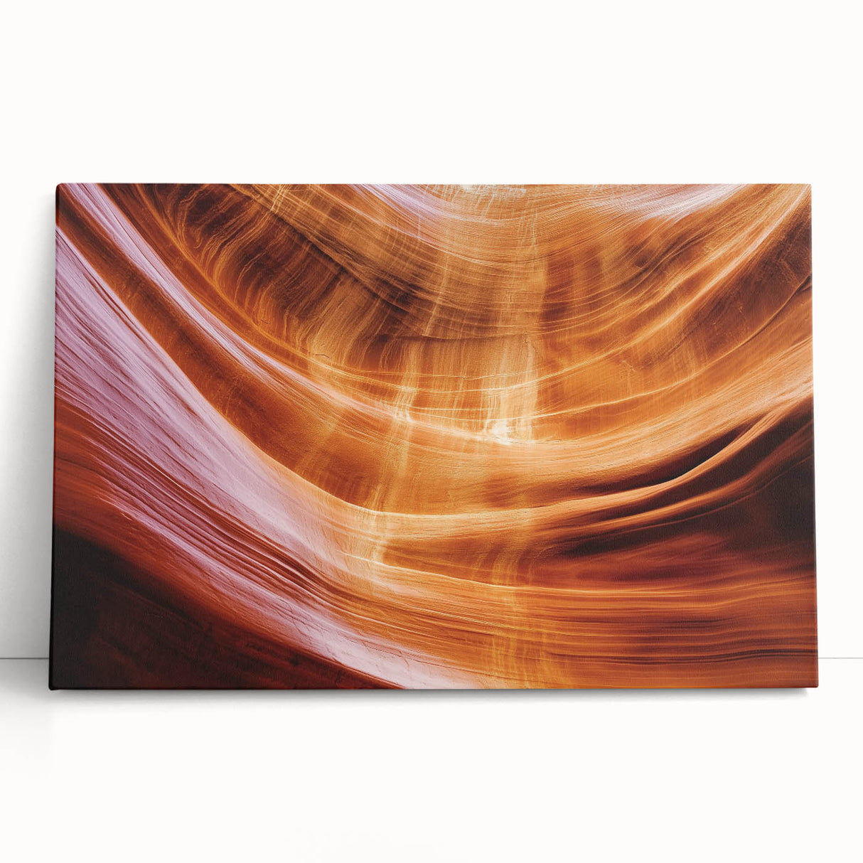 Stretched canvas artwork depicting a vibrant landscape of canyons in warm earthy tones, ideal for home decor, showcasing natural beauty and depth.